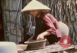 Image of villagers Vietnam, 1970, second 46 stock footage video 65675032671