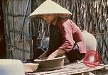 Image of villagers Vietnam, 1970, second 47 stock footage video 65675032671