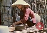 Image of villagers Vietnam, 1970, second 52 stock footage video 65675032671
