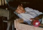 Image of villagers Vietnam, 1970, second 13 stock footage video 65675032672