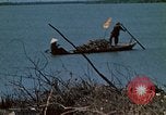 Image of villagers Vietnam, 1970, second 34 stock footage video 65675032672
