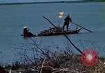 Image of villagers Vietnam, 1970, second 36 stock footage video 65675032672