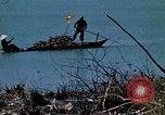 Image of villagers Vietnam, 1970, second 40 stock footage video 65675032672