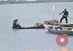 Image of villagers Vietnam, 1970, second 42 stock footage video 65675032672
