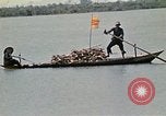 Image of villagers Vietnam, 1970, second 52 stock footage video 65675032672