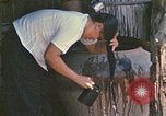 Image of villagers Vietnam, 1970, second 57 stock footage video 65675032672