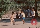 Image of Vietnamese boy Vietnam, 1970, second 32 stock footage video 65675032675
