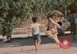 Image of Vietnamese boy Vietnam, 1970, second 36 stock footage video 65675032675
