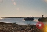 Image of Vietnamese Forces assault boats and armored cars Vietnam, 1970, second 4 stock footage video 65675032680
