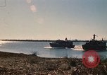 Image of Vietnamese Forces assault boats and armored cars Vietnam, 1970, second 5 stock footage video 65675032680