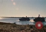 Image of Vietnamese Forces assault boats and armored cars Vietnam, 1970, second 6 stock footage video 65675032680