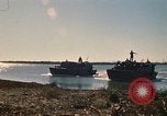 Image of Vietnamese Forces assault boats and armored cars Vietnam, 1970, second 8 stock footage video 65675032680