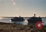 Image of Vietnamese Forces assault boats and armored cars Vietnam, 1970, second 9 stock footage video 65675032680