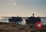Image of Vietnamese Forces assault boats and armored cars Vietnam, 1970, second 10 stock footage video 65675032680