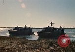 Image of Vietnamese Forces assault boats and armored cars Vietnam, 1970, second 11 stock footage video 65675032680