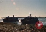 Image of Vietnamese Forces assault boats and armored cars Vietnam, 1970, second 12 stock footage video 65675032680
