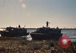 Image of Vietnamese Forces assault boats and armored cars Vietnam, 1970, second 13 stock footage video 65675032680