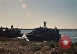 Image of Vietnamese Forces assault boats and armored cars Vietnam, 1970, second 15 stock footage video 65675032680