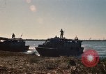Image of Vietnamese Forces assault boats and armored cars Vietnam, 1970, second 16 stock footage video 65675032680