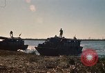 Image of Vietnamese Forces assault boats and armored cars Vietnam, 1970, second 17 stock footage video 65675032680