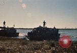 Image of Vietnamese Forces assault boats and armored cars Vietnam, 1970, second 19 stock footage video 65675032680