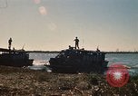 Image of Vietnamese Forces assault boats and armored cars Vietnam, 1970, second 20 stock footage video 65675032680