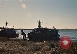 Image of Vietnamese Forces assault boats and armored cars Vietnam, 1970, second 24 stock footage video 65675032680