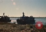 Image of Vietnamese Forces assault boats and armored cars Vietnam, 1970, second 27 stock footage video 65675032680