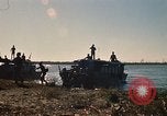 Image of Vietnamese Forces assault boats and armored cars Vietnam, 1970, second 33 stock footage video 65675032680