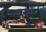 Image of Vietnamese Forces assault boats and armored cars Vietnam, 1970, second 39 stock footage video 65675032680