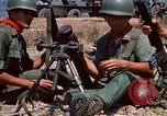 Image of  Vietnamese Forces set up mortar Vietnam, 1970, second 37 stock footage video 65675032681