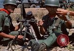 Image of  Vietnamese Forces set up mortar Vietnam, 1970, second 39 stock footage video 65675032681