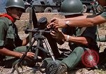 Image of  Vietnamese Forces set up mortar Vietnam, 1970, second 41 stock footage video 65675032681
