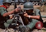 Image of  Vietnamese Forces set up mortar Vietnam, 1970, second 42 stock footage video 65675032681