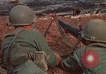 Image of RF-PF forces with M-60 machine gun and M-79 Grenade Launcher Vietnam, 1970, second 15 stock footage video 65675032682