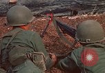 Image of RF-PF forces with M-60 machine gun and M-79 Grenade Launcher Vietnam, 1970, second 16 stock footage video 65675032682