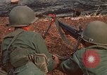 Image of RF-PF forces with M-60 machine gun and M-79 Grenade Launcher Vietnam, 1970, second 17 stock footage video 65675032682