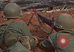 Image of RF-PF forces with M-60 machine gun and M-79 Grenade Launcher Vietnam, 1970, second 18 stock footage video 65675032682