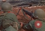 Image of RF-PF forces with M-60 machine gun and M-79 Grenade Launcher Vietnam, 1970, second 19 stock footage video 65675032682