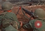 Image of RF-PF forces with M-60 machine gun and M-79 Grenade Launcher Vietnam, 1970, second 20 stock footage video 65675032682
