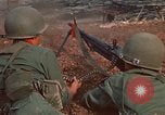 Image of RF-PF forces with M-60 machine gun and M-79 Grenade Launcher Vietnam, 1970, second 22 stock footage video 65675032682