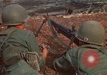 Image of RF-PF forces with M-60 machine gun and M-79 Grenade Launcher Vietnam, 1970, second 23 stock footage video 65675032682