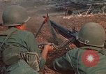 Image of RF-PF forces with M-60 machine gun and M-79 Grenade Launcher Vietnam, 1970, second 28 stock footage video 65675032682