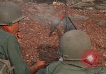 Image of RF-PF forces with M-60 machine gun and M-79 Grenade Launcher Vietnam, 1970, second 32 stock footage video 65675032682