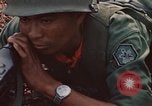 Image of RF-PF forces with M-60 machine gun and M-79 Grenade Launcher Vietnam, 1970, second 33 stock footage video 65675032682