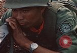 Image of RF-PF forces with M-60 machine gun and M-79 Grenade Launcher Vietnam, 1970, second 35 stock footage video 65675032682