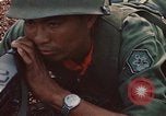 Image of RF-PF forces with M-60 machine gun and M-79 Grenade Launcher Vietnam, 1970, second 36 stock footage video 65675032682