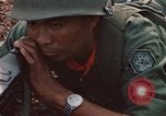 Image of RF-PF forces with M-60 machine gun and M-79 Grenade Launcher Vietnam, 1970, second 38 stock footage video 65675032682