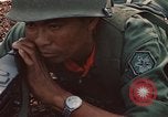 Image of RF-PF forces with M-60 machine gun and M-79 Grenade Launcher Vietnam, 1970, second 39 stock footage video 65675032682