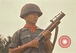 Image of RF-PF forces with M-60 machine gun and M-79 Grenade Launcher Vietnam, 1970, second 41 stock footage video 65675032682